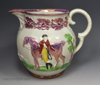 Pearlware pottery moulded jug decorated with pink lustre, circa 1820