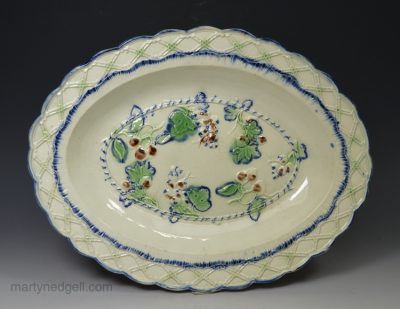 Pearlware pottery shallow dish decorated with blue and green under the glaze, circa 1790