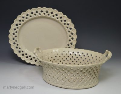 Staffordshire white saltglaze stoneware pierced basket and stand, circa 1760