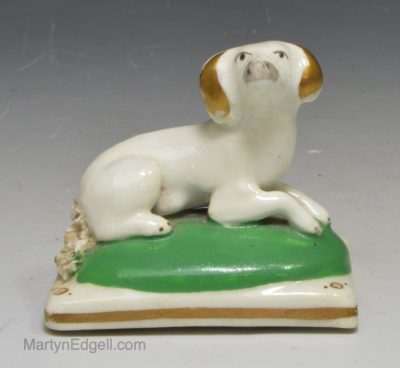 Staffordshire porcelain figure of a dog, circa 1830