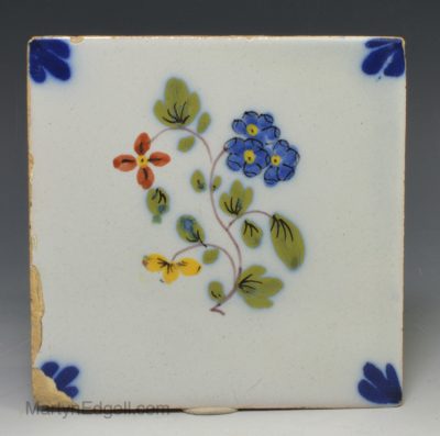 Liverpool delft tile decorated with a Fazakerley floral, circa 1750