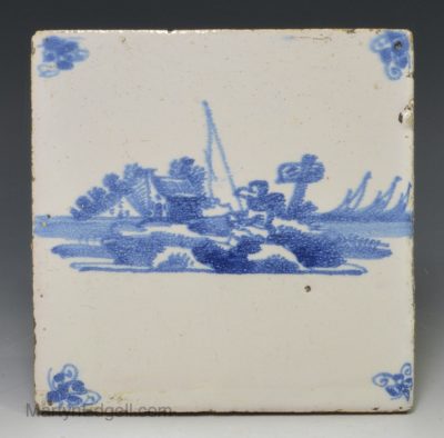 Dutch Delft tile decorated with a man fishing, circa 1750