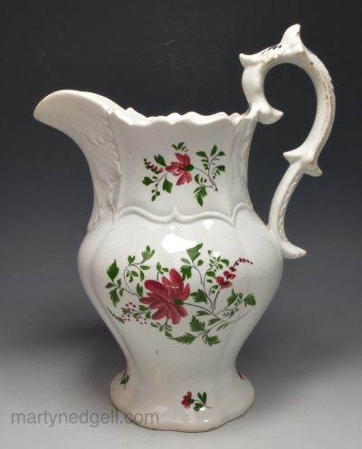 Pearlware pottery jug decorated with florals, circa 1840