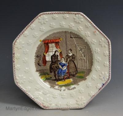Pearlware pottery child's plate 'Drawing a Tooth', circa 1840