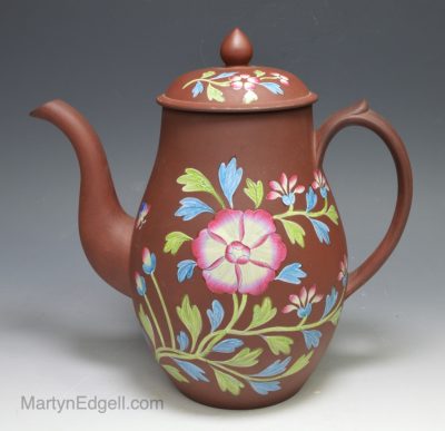 Spode pottery red stoneware coffee pot decorated with enamel florals, circa 1820
