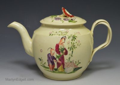 Creamware pottery teapot decorated with enamel over the glaze, circa 1770