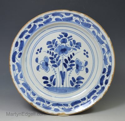 London delft plate painted with florals in blue, circa 1720