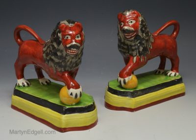 Pair of Staffordshire pearlware pottery figures of lions, circa 1820
