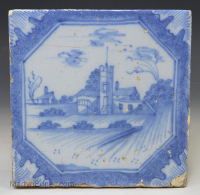 Liverpool delft tile decorated in blue of a church, circa 1750