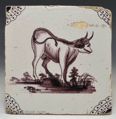 Liverpool delft tile decorated with a cow in manganese, circa 1750