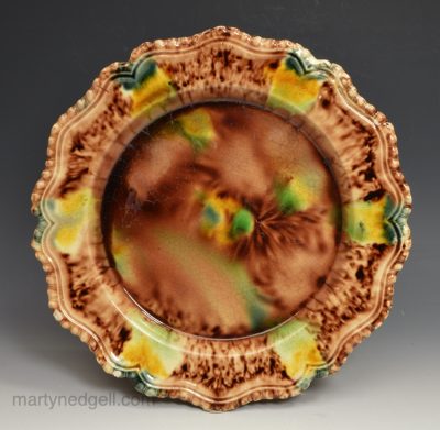 Creamware pottery plate decorated with Whieldon colours under the glaze, circa 1780