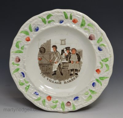 Pearlware pottery child's plate 'THE VILLAGE BRBER', circa 1830