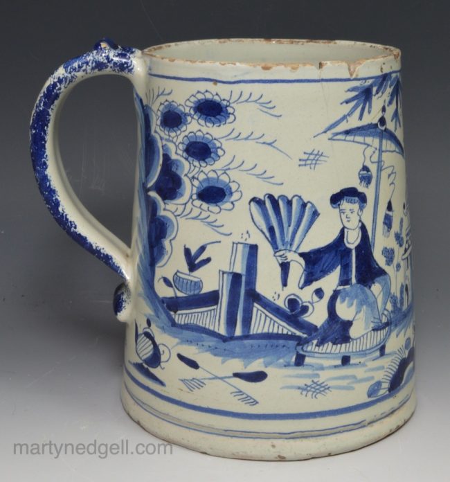 Large London delft mug painted in blue, circa 1700