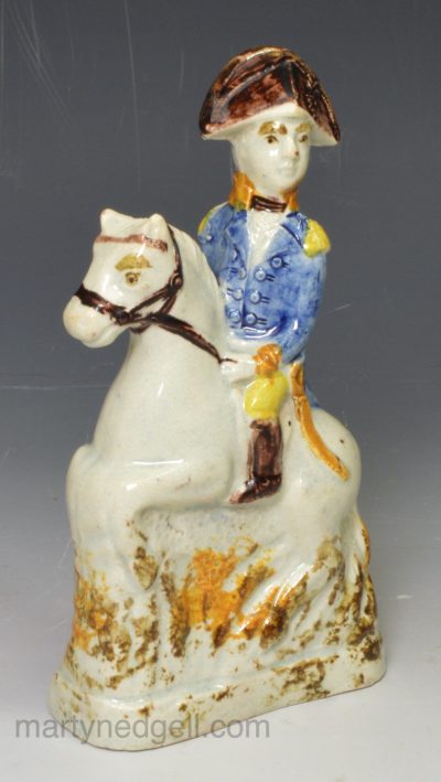 Prattware pottery figure of Napoleon decorated with colours under the glaze, circa 1800