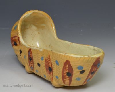 Creamware pottery toy cradle, circa 1820