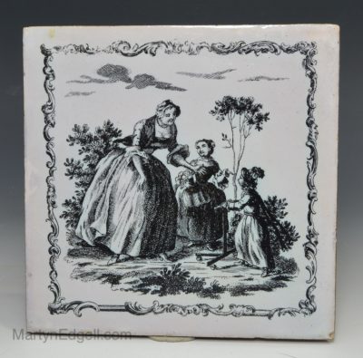 Liverpool delft Sadler printed tile of a nursemaid with two children, one learning to walk, circa 1765