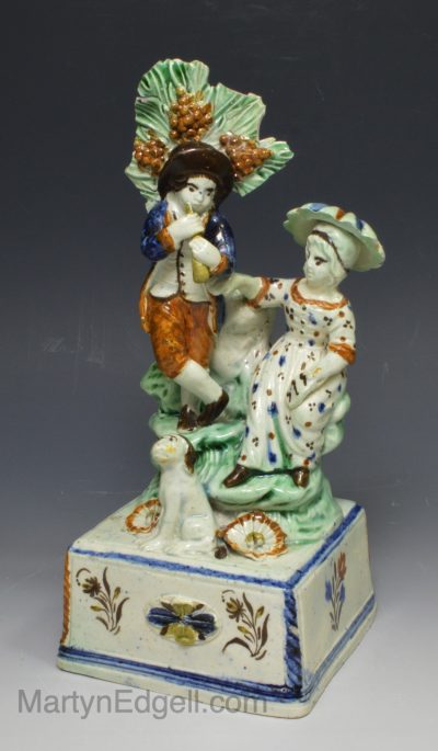 Pearlware pottery figure of a girl and a boy, circa 1790