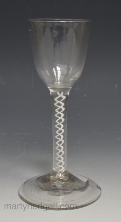 English wine glass with an opaque white spiral in the stem, circa 1770