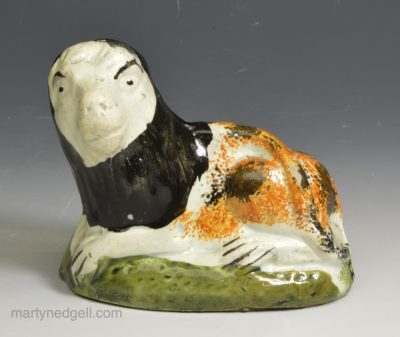 Pearlware pottery figure of a lion , circa 1820