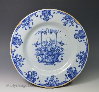 Liverpool delft plate painted with a floral design, circa 1750