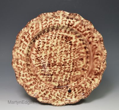 Creamware pottery plate decorated with Whieldon colours under the glaze, circa 1770