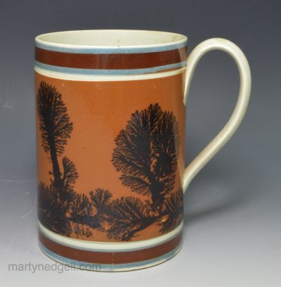 Slip decorated pearlware pottery mocha mug, circa 1820