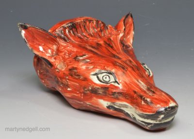 Creamware pottery fox head stirrup cup, circa 1820