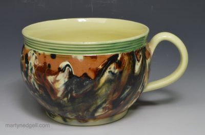 Creamware pottery cup decorated with curdled slip, mochaware, circa 1820