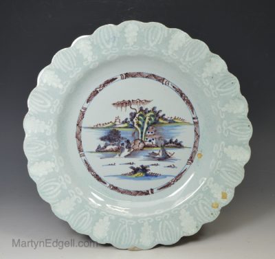 Bristol delft plate decorated in a landscape scene, circa 1750