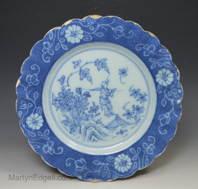 London delft decorated with scallop edging with a chinese man, circa 1750