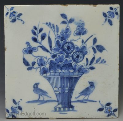 Liverpool delft tile painted with florals and a couple of birds in blue, circa 1750
