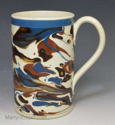 Pearlware pottery mug decorated with curdled slip, circa 1820