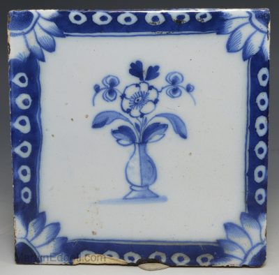 Liverpool delft tile painted with floral decoration in blue, circa 1770