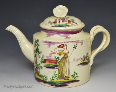 Creamware pottery teapot decorated with enamels over the glaze, circa 1770